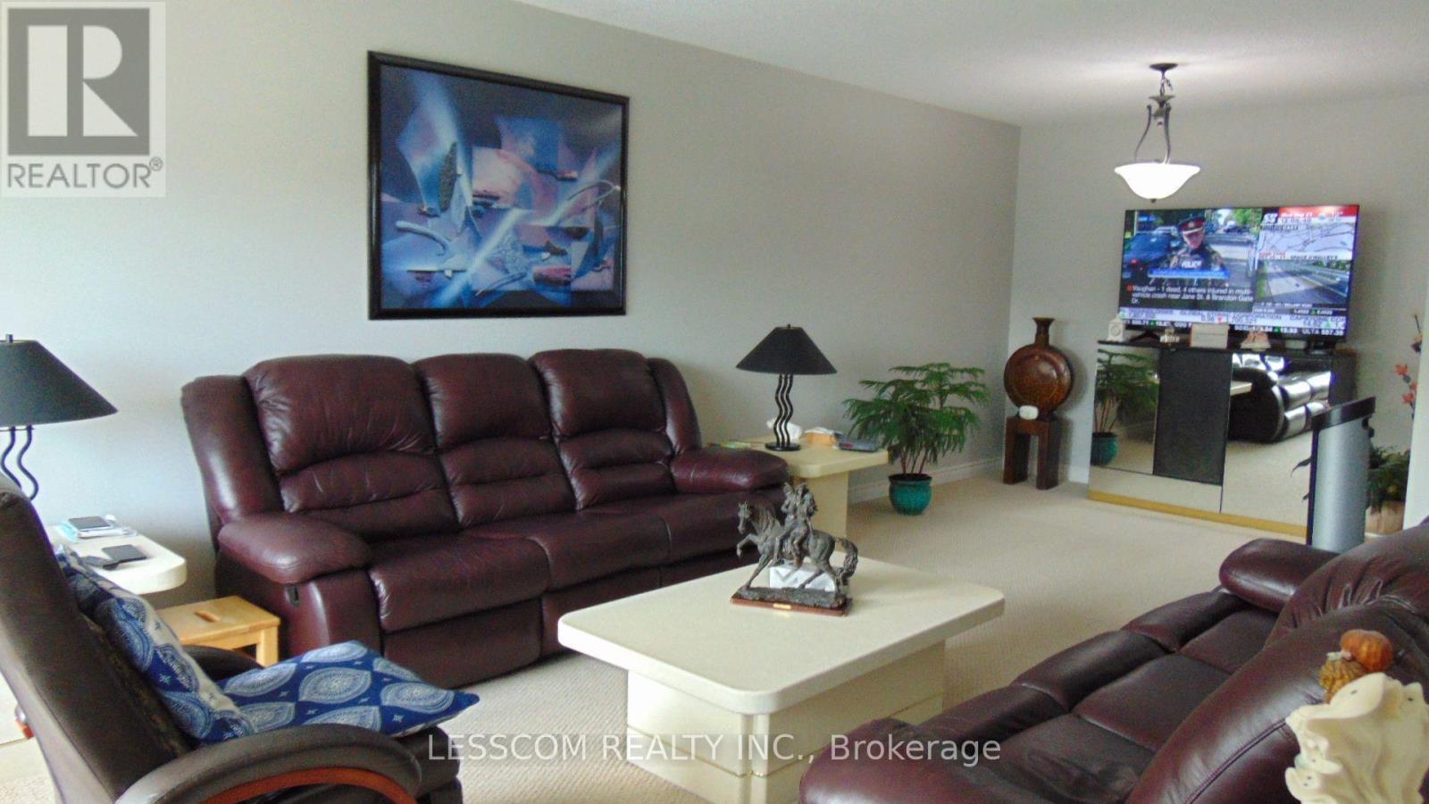 LIVING ROOM & DINING ROOM - 335 Royal Salisbury Way, Brampton, ON