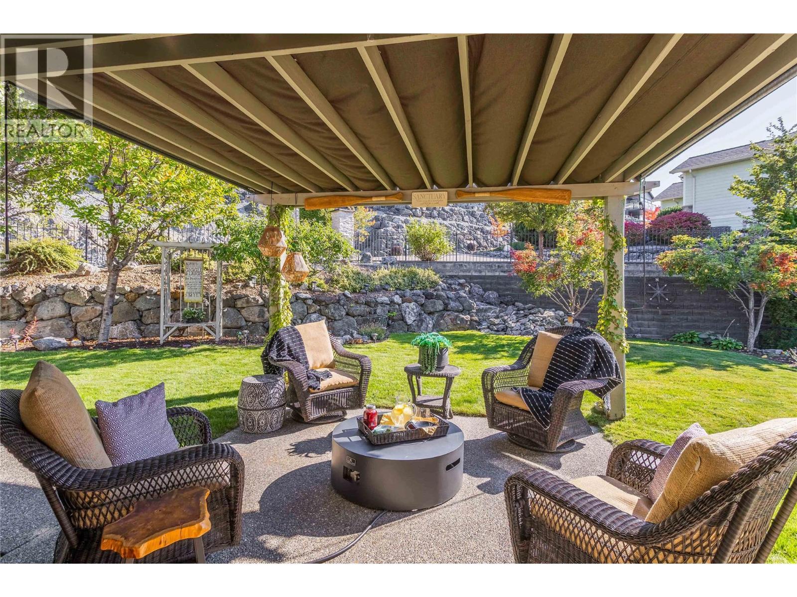 tranquil rear patio space - 1113 Mt Fosthall Drive, Vernon, BC
