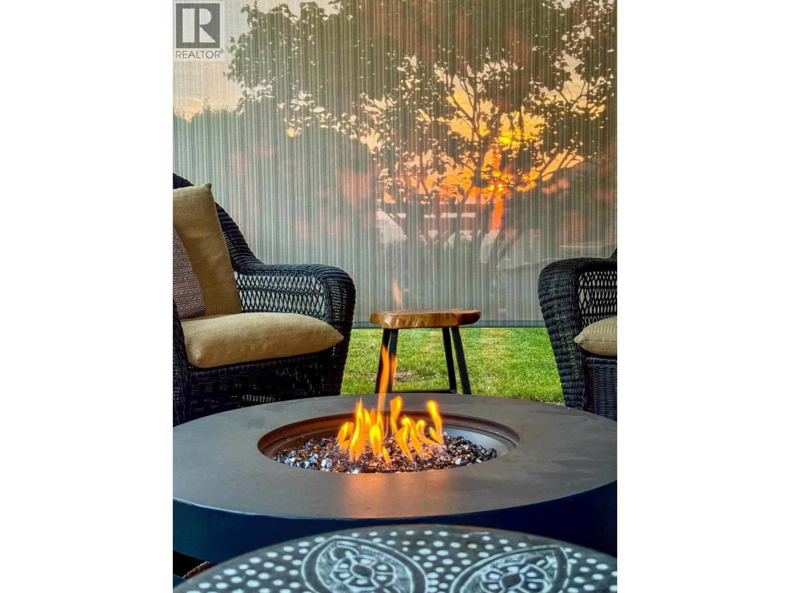 Pull-down shades keep the warmth in in the evenings or fall days! - 1113 Mt Fosthall Drive, Vernon, BC