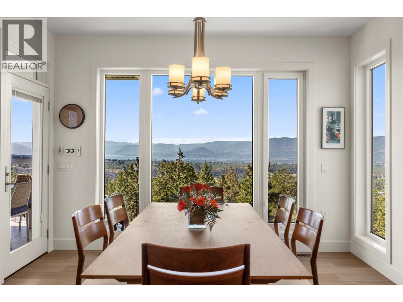 Lake and mountain views from the dinner table - 2442 Bella Vista Street, Kelowna, BC