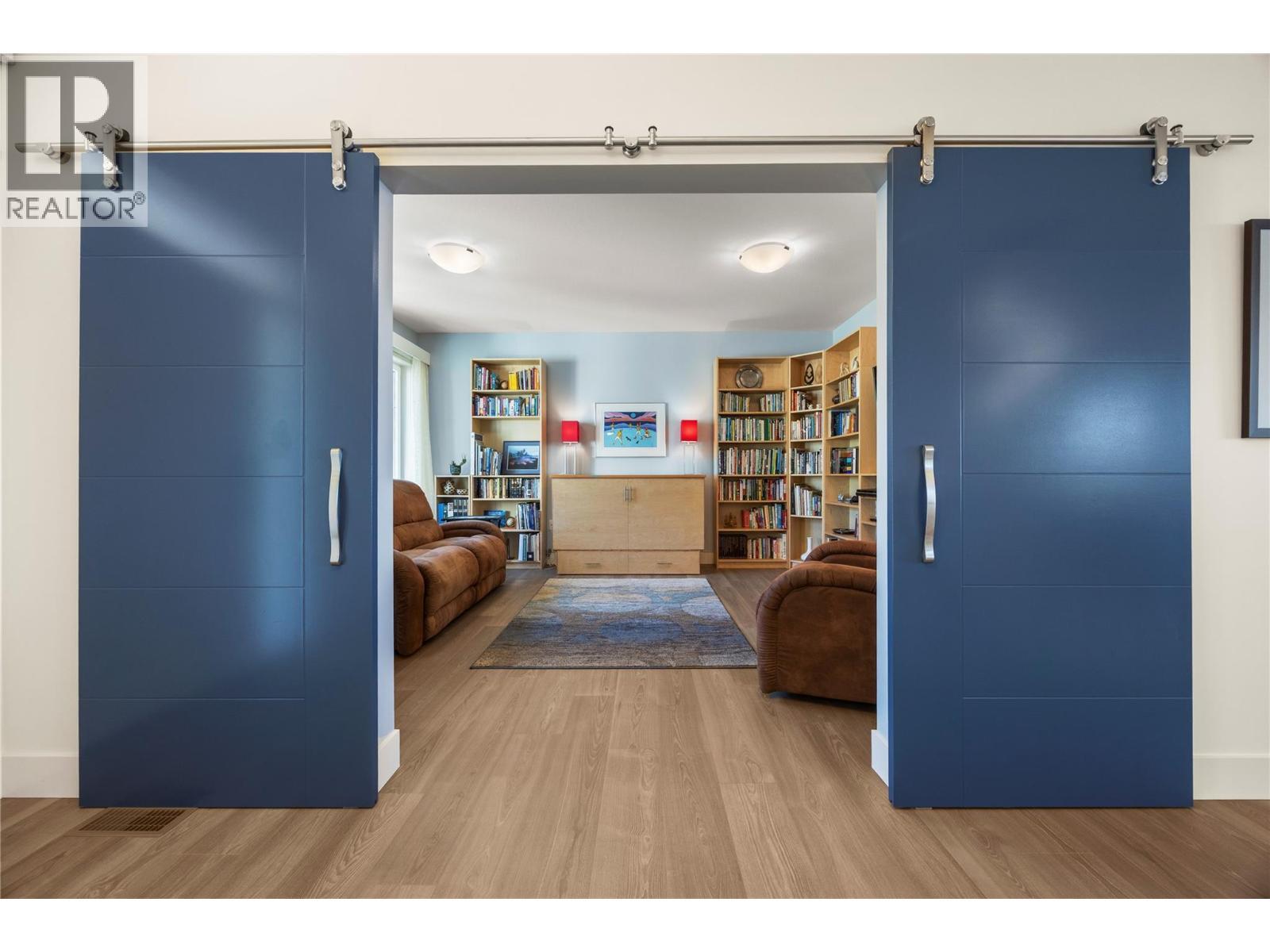 Barn door entrance to main floor den/flex space - 2442 Bella Vista Street, Kelowna, BC