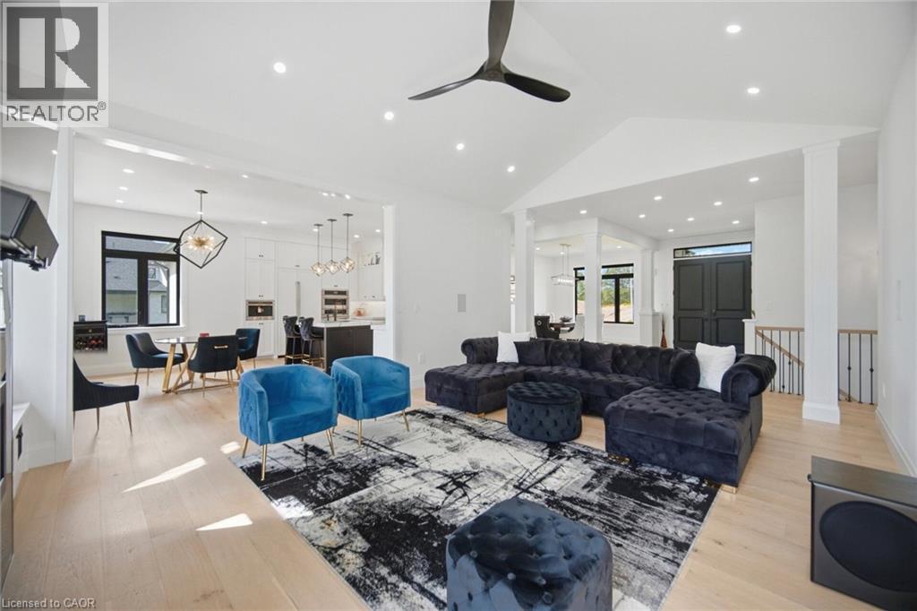 Vaulted ceiling with recessed lighting and a ceiling fan - 56 Augustus Street, Scotland, ON