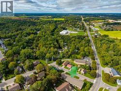 Aerial perspective of a residential area with established trees -