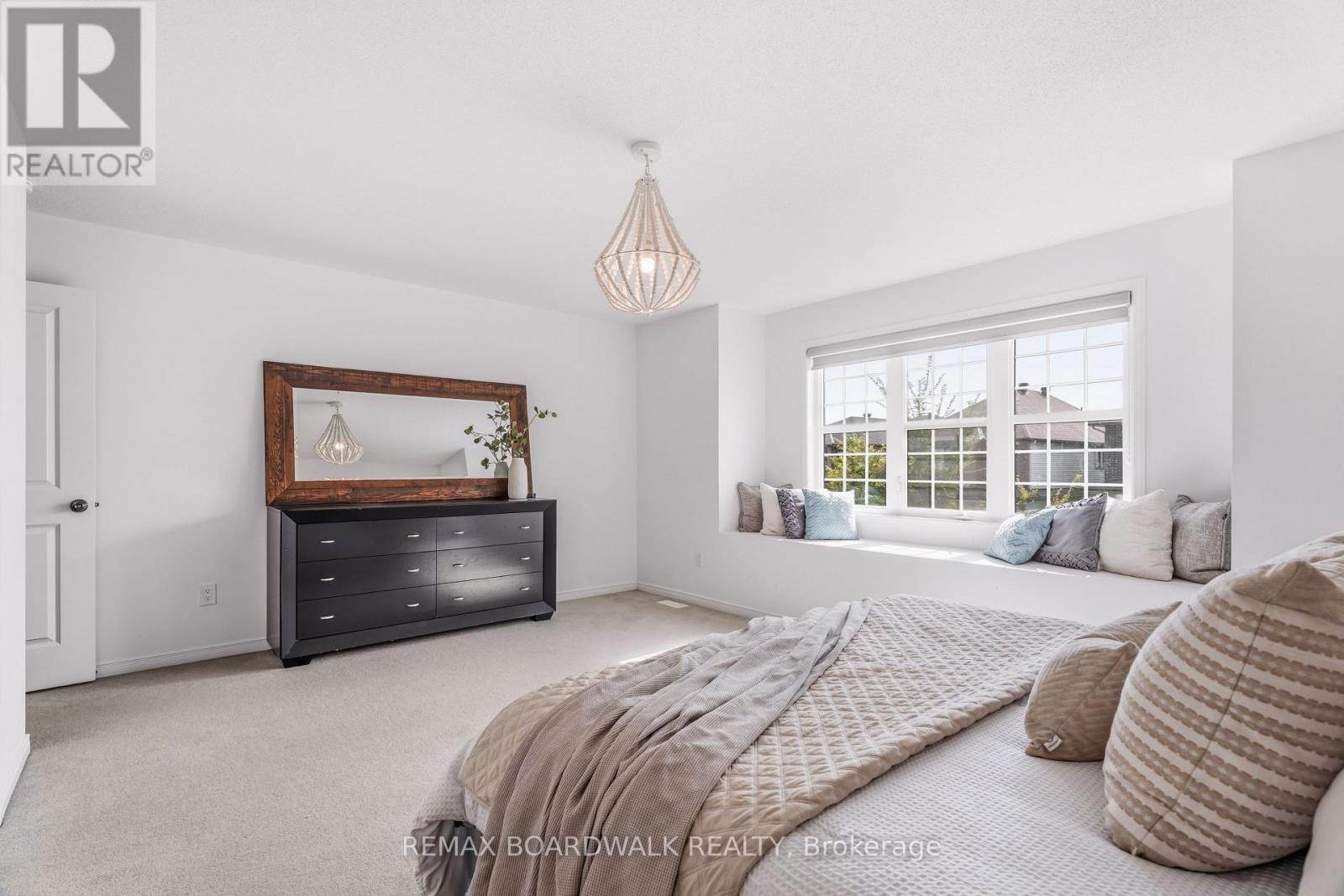 Window bench adds charm to the primary suite - 210 Pingwi Place, Ottawa, ON