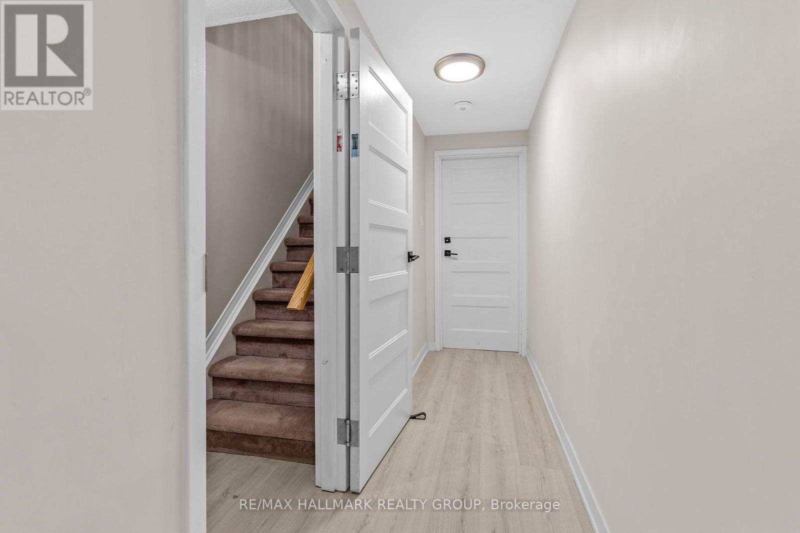 Lower-level secondary unit private entrance hall - 5 Rayburn Street, Ottawa, ON