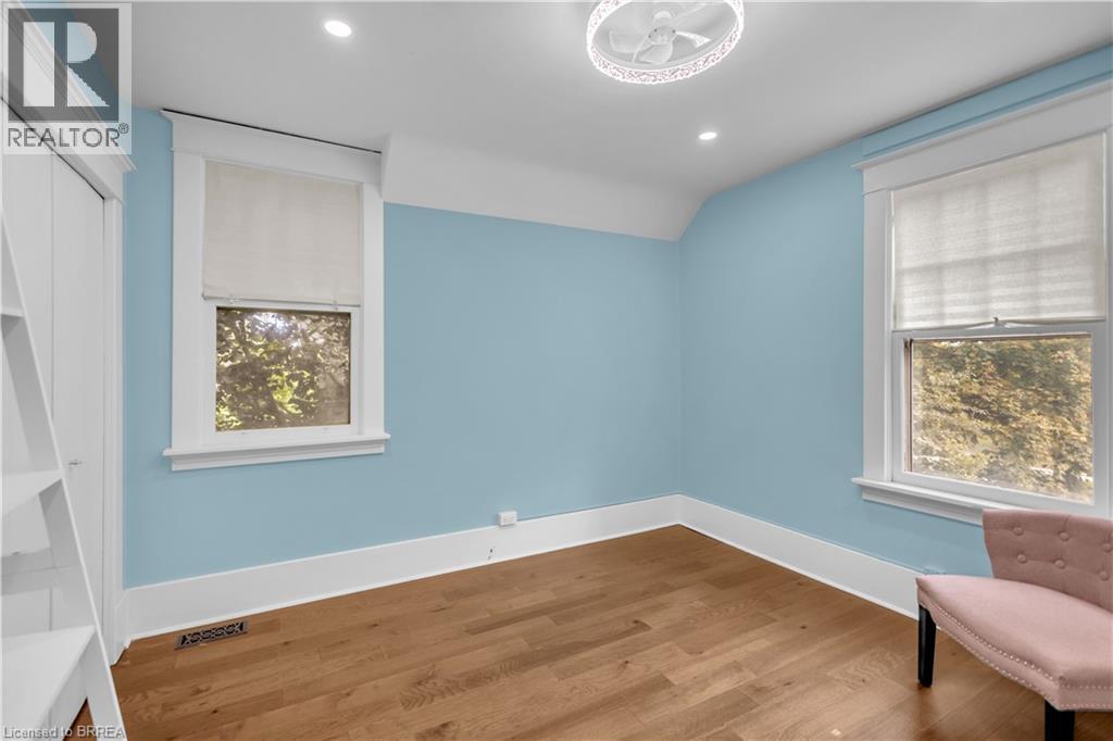 Hardwood flooring, recessed lighting, and a ceiling fan with integrated lighting - 11 Tutela Heights Road, Brantford, ON