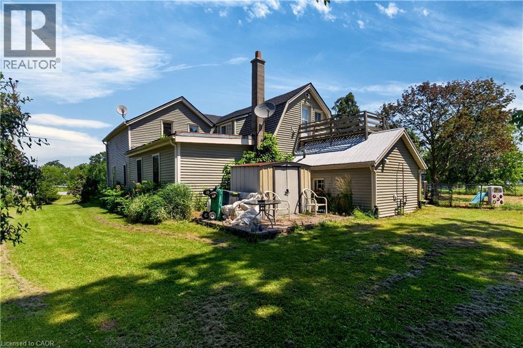 Expansive backyard featuring a large green space - 42841 Highway 3, Wainfleet, ON