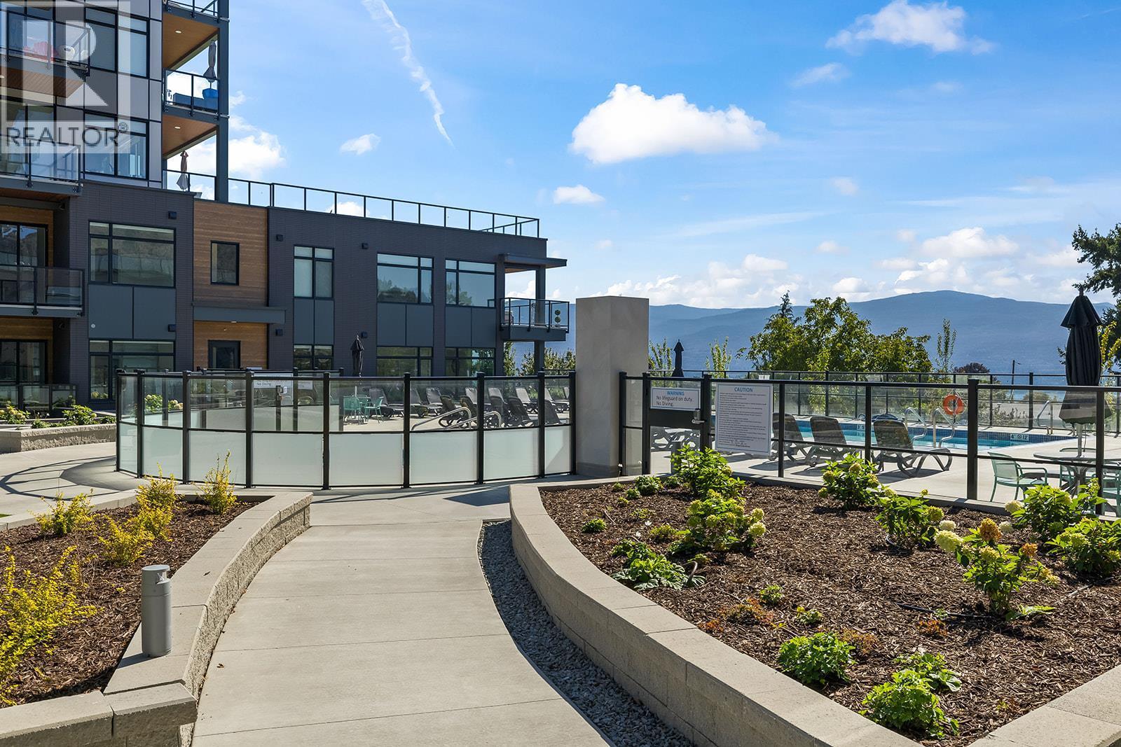 Outdoor Community Space with access to the Outdoor Pool and Hot Tub - 2780 Olalla Road Unit# 107, West Kelowna, BC