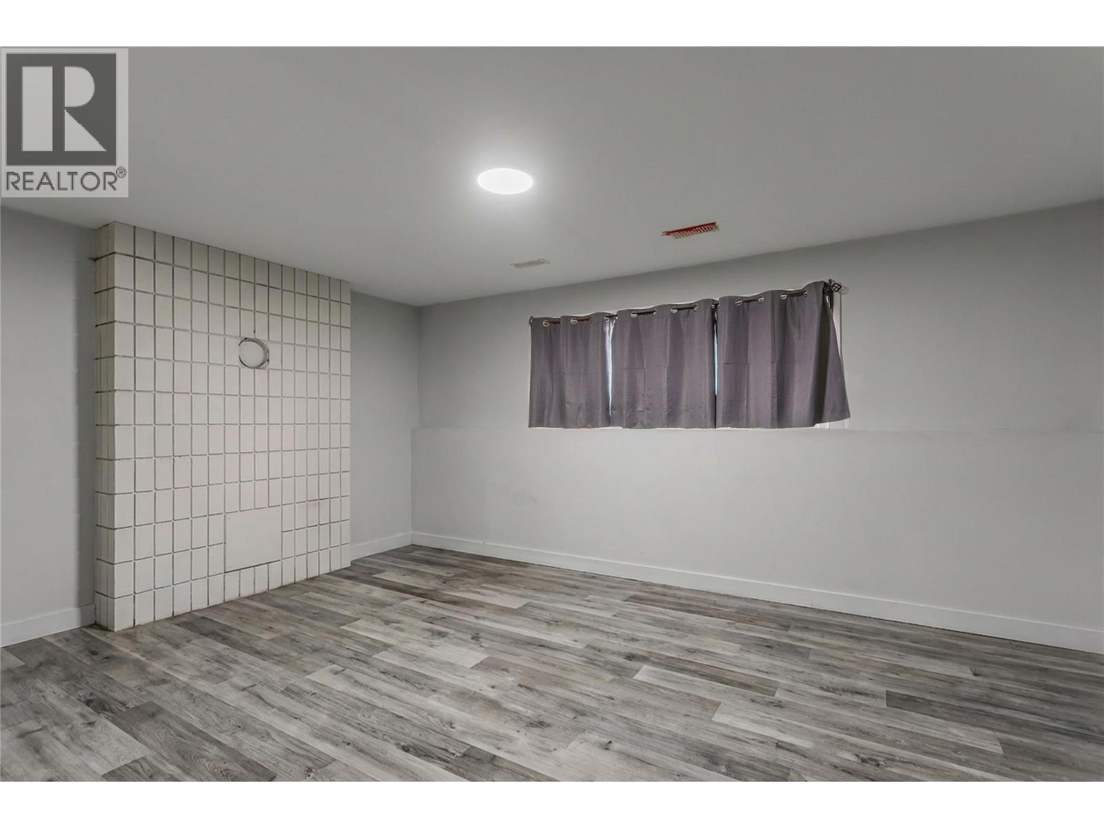 Legal Suite Living Room - 758 Josselyn Court, Kelowna, BC