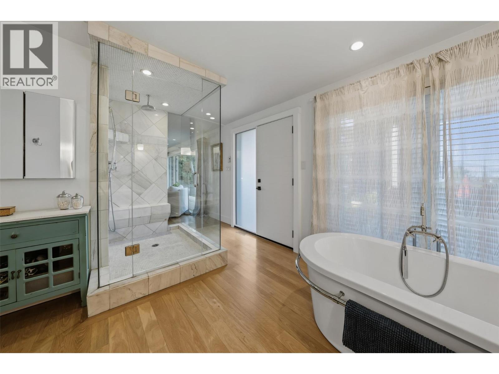 Walk out to deck and hot tub. - 5147 Lakeshore Road, Kelowna, BC