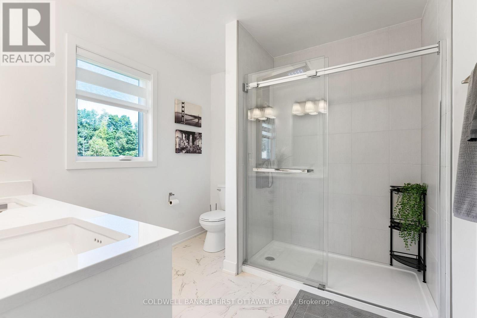 Primary ensuite glass shower with multiple jets - 268 Boyds Road, Lanark Highlands, ON