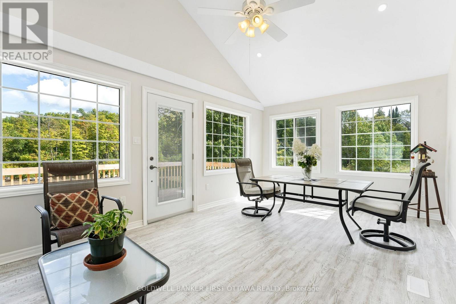 Cathedral ceiling and potlight in family room - 8688 Highway 511, Lanark Highlands, ON