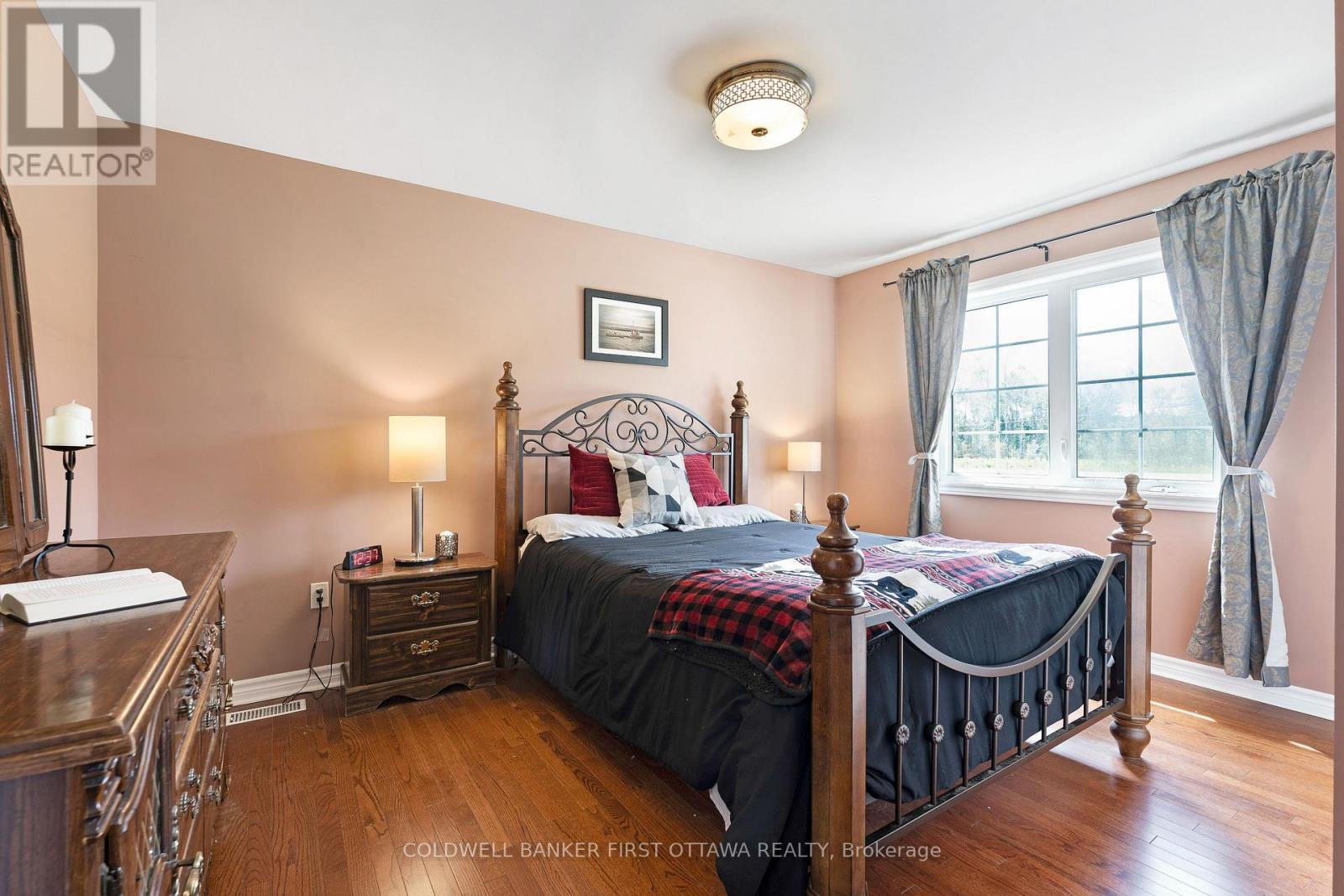 Primary bedroom with built-in closet - 8688 Highway 511, Lanark Highlands, ON