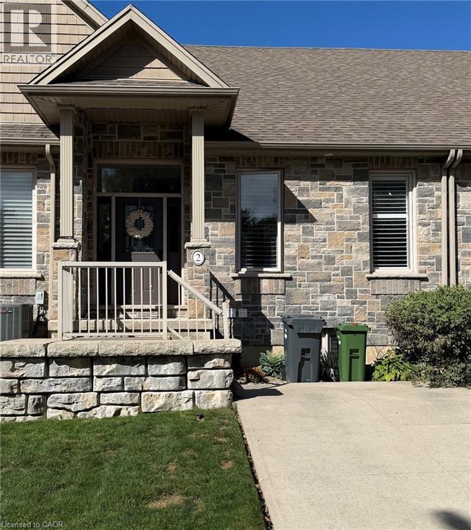 Front entrance with parking pad in front. - 9 Old Hamilton Road Unit# 2, Port Dover, ON