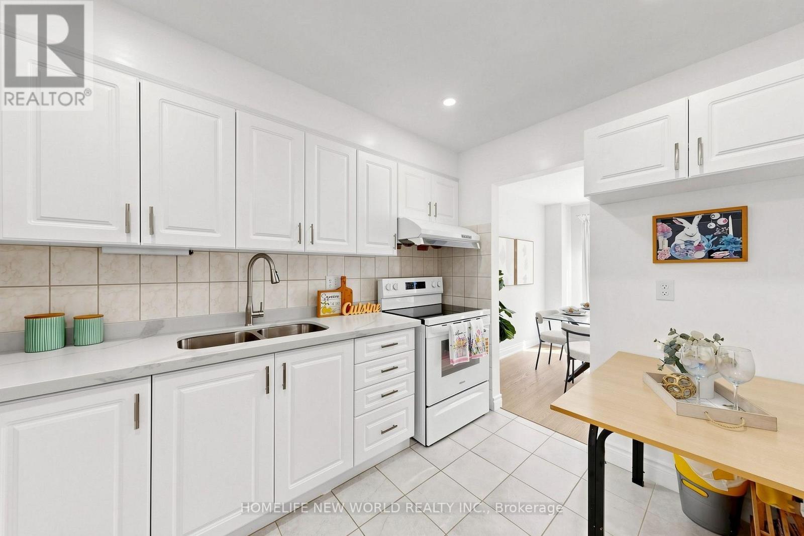 Kitchen - 49 - 100 Bridletowne Circle, Toronto, ON