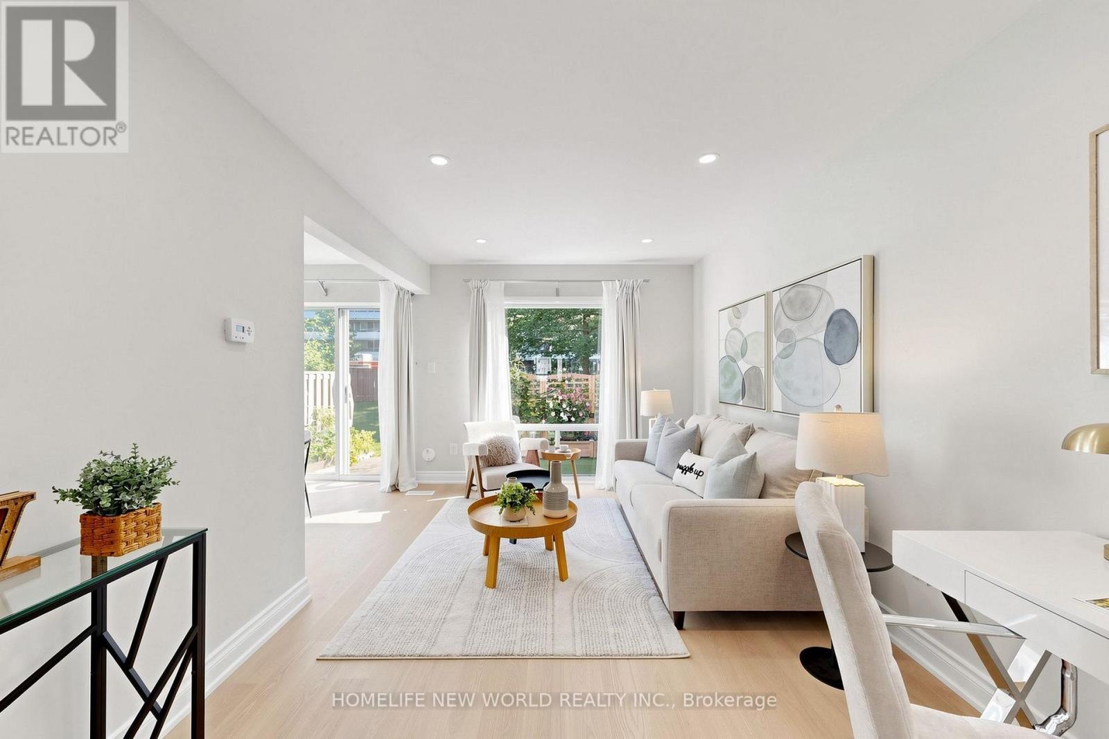 Living Room - 49 - 100 Bridletowne Circle, Toronto, ON