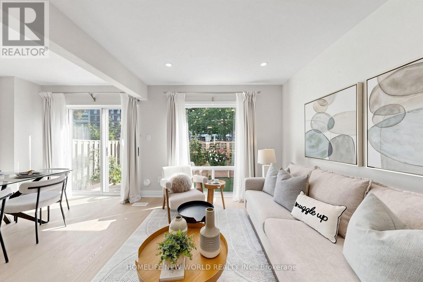 Living Room - 49 - 100 Bridletowne Circle, Toronto, ON