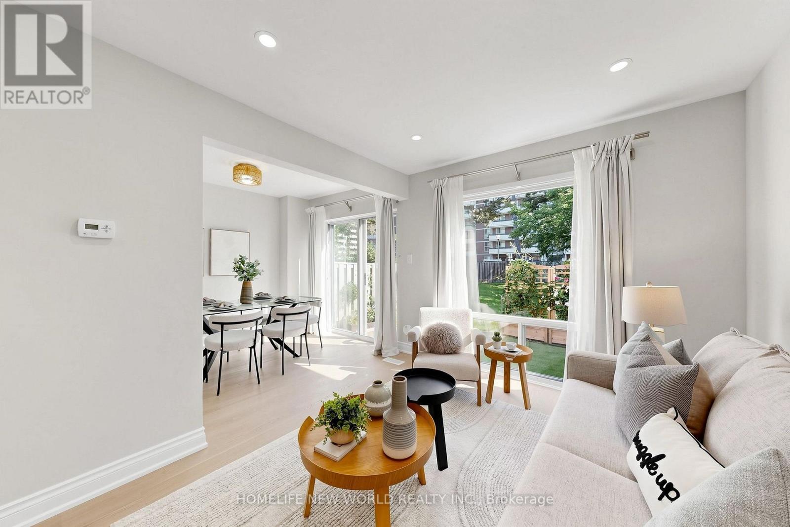 Living Room - 49 - 100 Bridletowne Circle, Toronto, ON