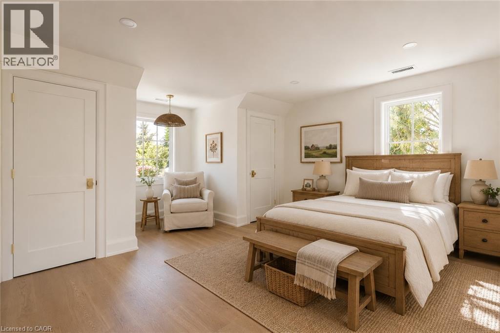 Light wood-finish flooring, recessed lighting, and a white paneled door - 130 Edgecliffe Place, Halton, ON