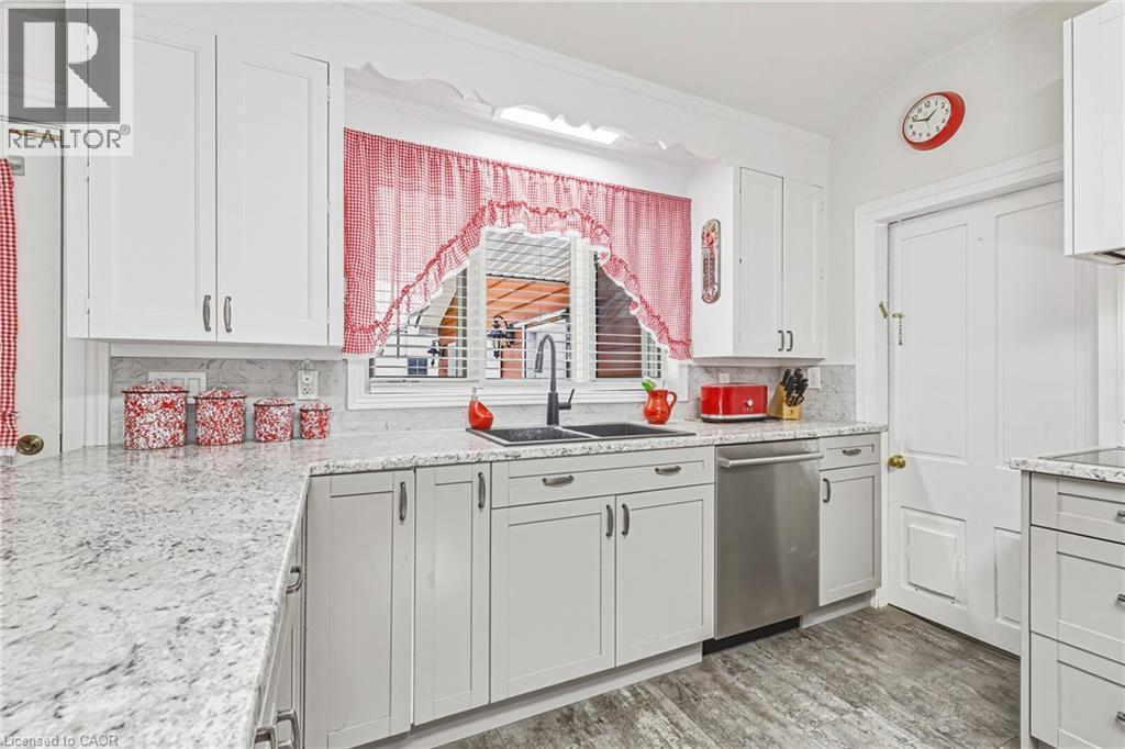 Behind Door on the Right, Main Floor Laundry and... - 670 Mount Pleasant Road, Mount Pleasant, ON