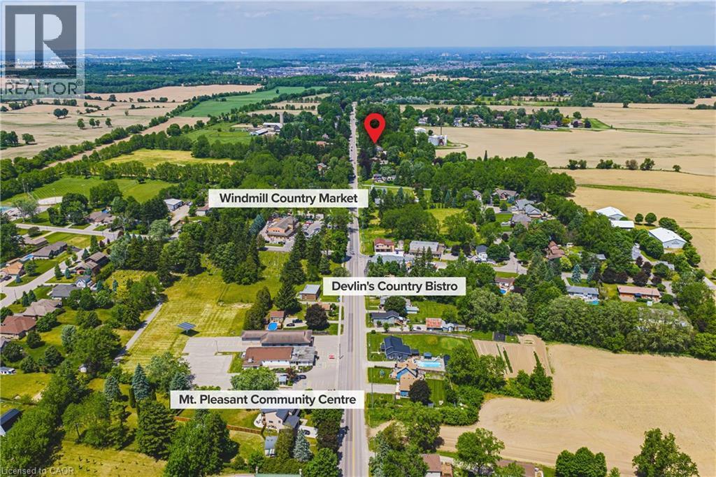There's even Grocery, Fine Dining and a Community Centre nearby - 670 Mount Pleasant Road, Mount Pleasant, ON