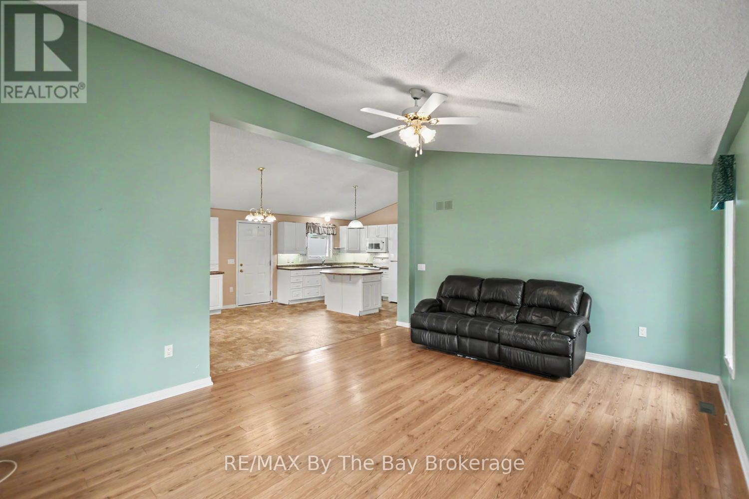 Living Area with Catherdral Ceilings - 30 St James Place, Wasaga Beach, ON