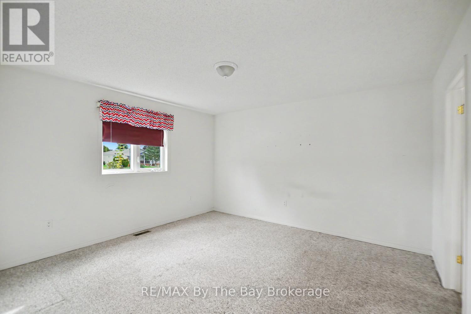 Primary Bedroom with 2 Piece Ensuite - 30 St James Place, Wasaga Beach, ON