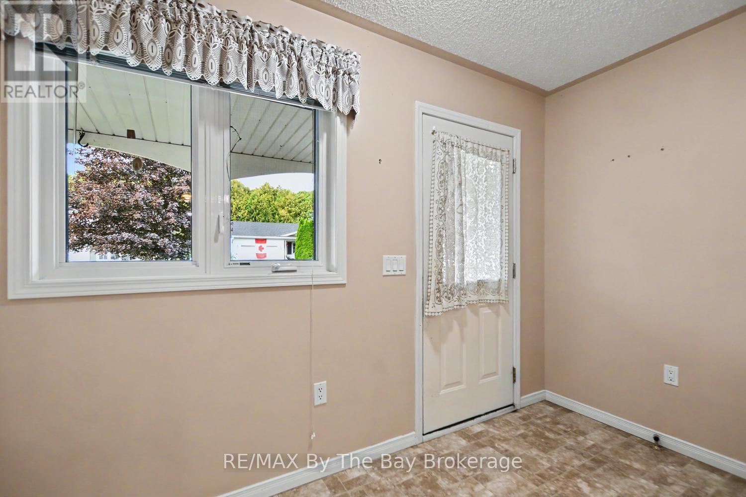 Large Front Foyer with Coat Closet - 30 St James Place, Wasaga Beach, ON