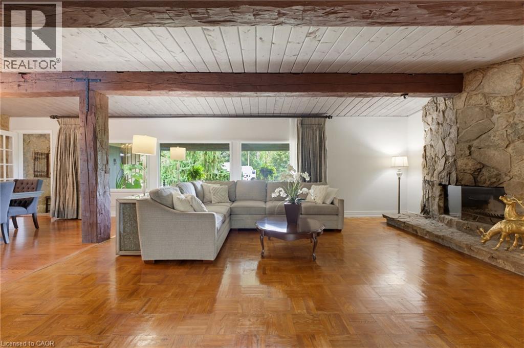 Exposed wood beams and a white wood-panel ceiling - 1316 Nevarc Drive, Burlington, ON