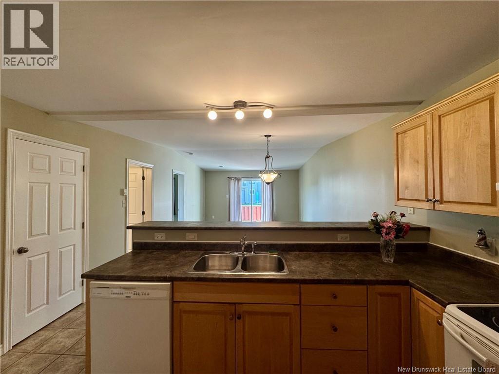 Kitchen with raised island - 26 Acorn Drive, Saint John, NB