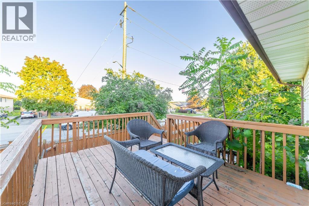 Wooden deck with railing - 137 Nickolas Crescent, Cambridge, ON