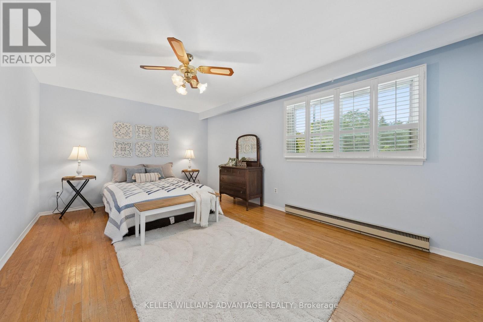 Primary bedroom with 2 double closets - 128 Holmcrest Trail, Toronto, ON