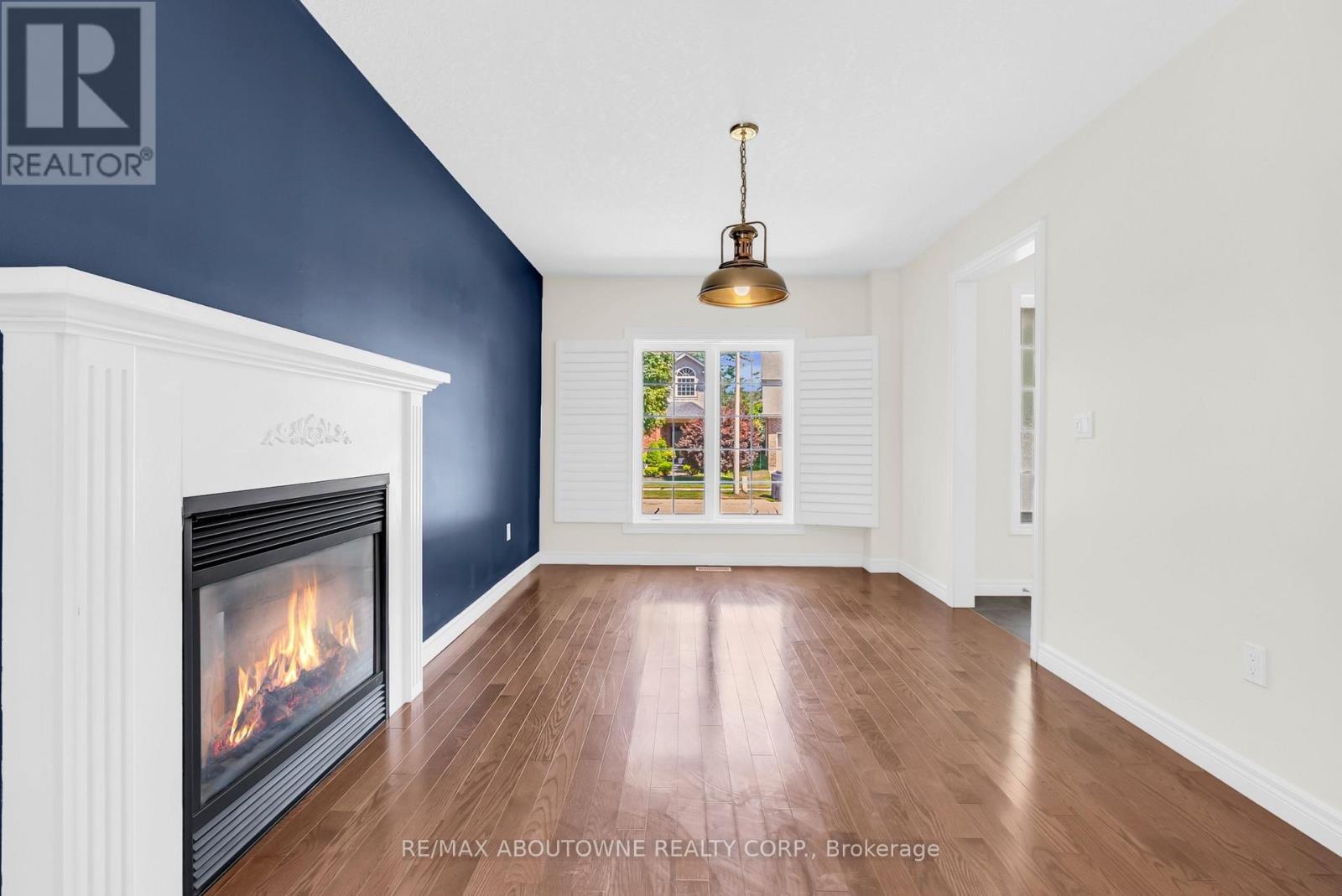 Fireplace in Between - 18 Haney Drive, Guelph, ON