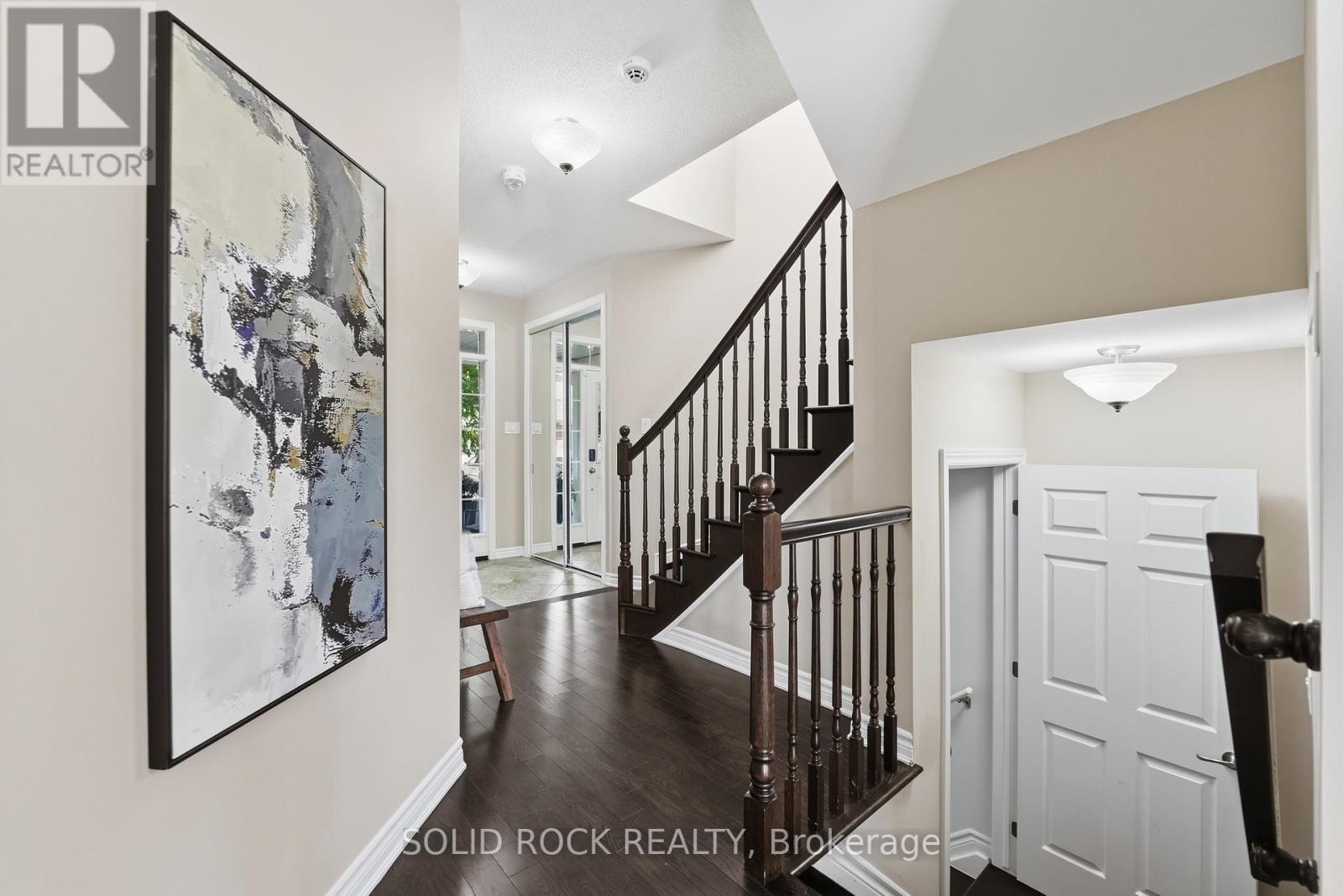 Hardwood flooring, staircase, and landings - 55 Solaris Drive, Ottawa, ON