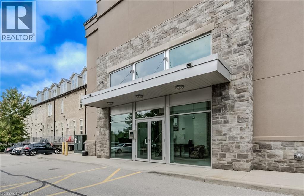 Stone veneer and stucco exterior with multiple large windows - 25 Concession Street Unit# 110, Cambridge, ON