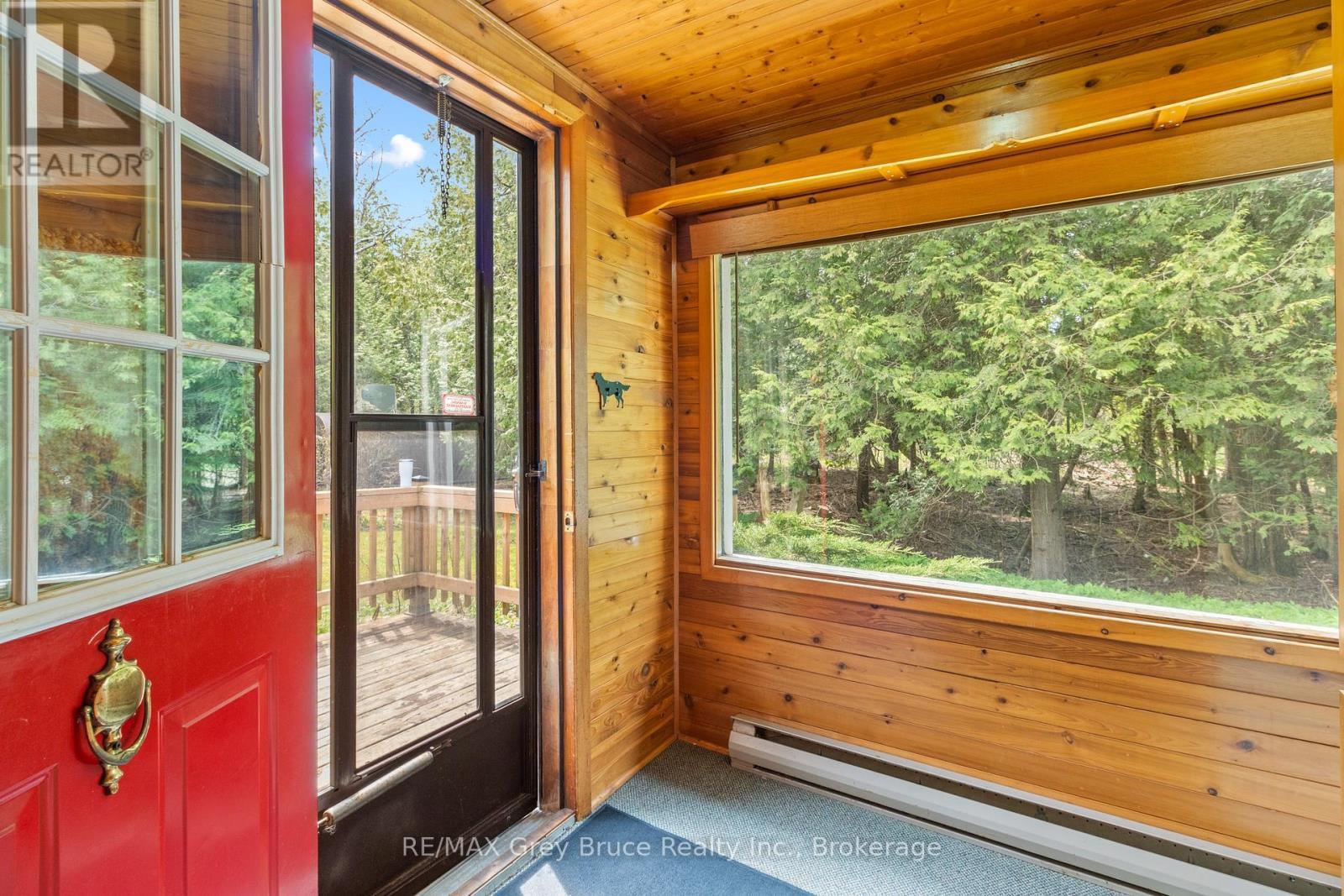 Large windows & wood features - 28 Stewarts Point, Northern Bruce Peninsula, ON