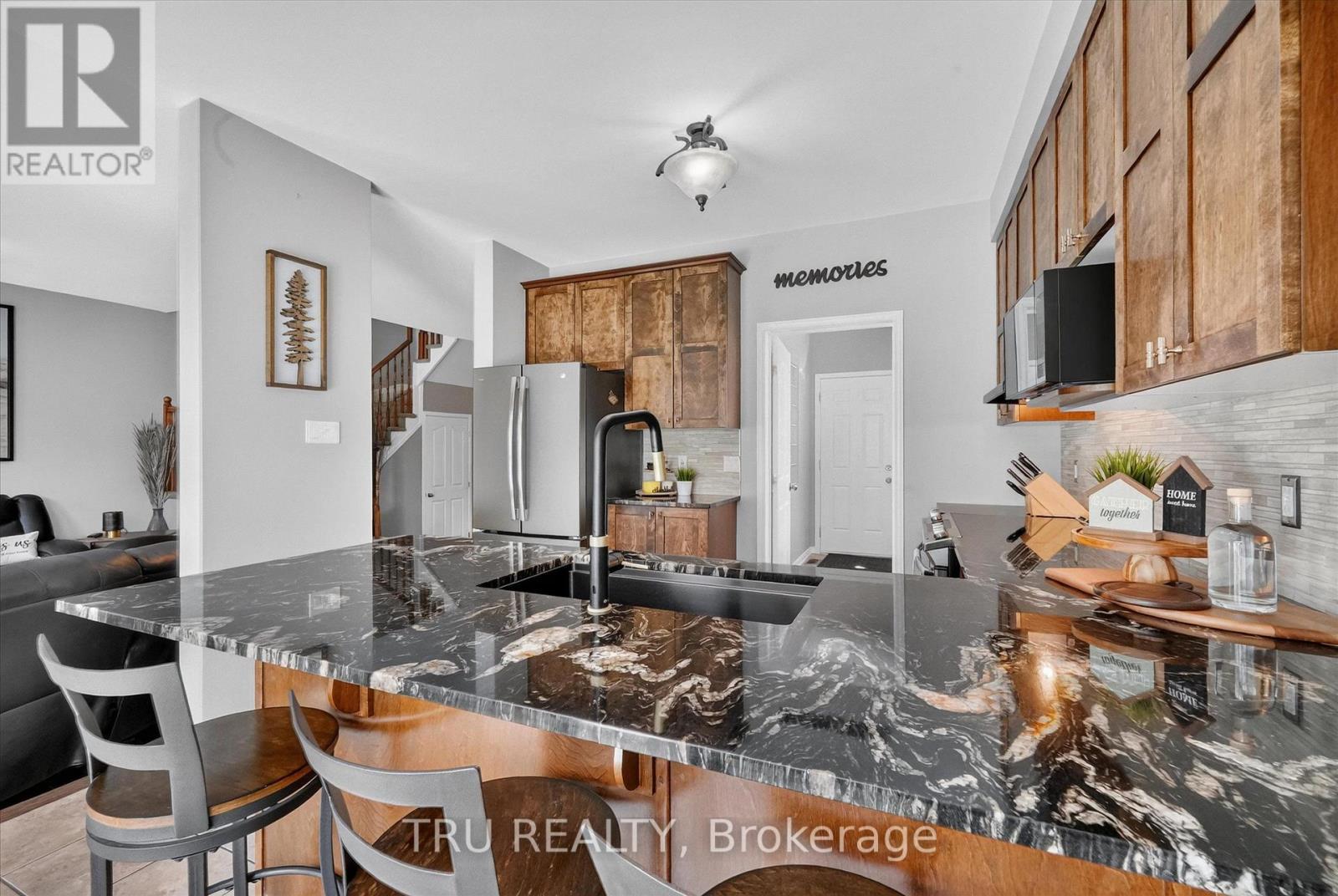 kitchen with new granite counter, and more - 325 Upcountry Drive E, Ottawa, ON