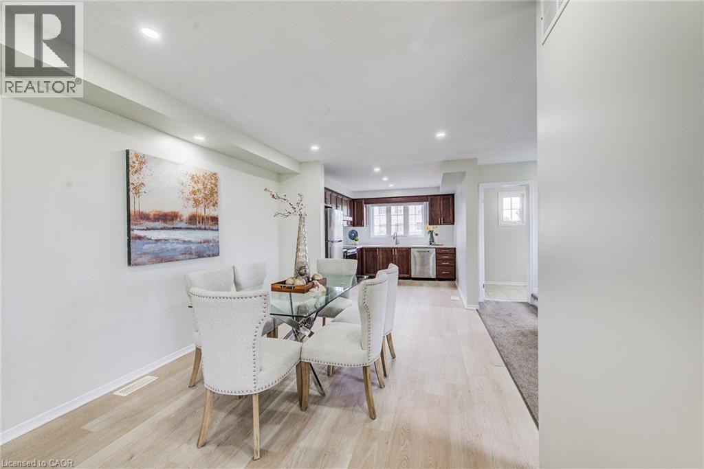 Recessed lighting illuminates the dining area and kitchen - 226 Maitland Street, Kitchener, ON