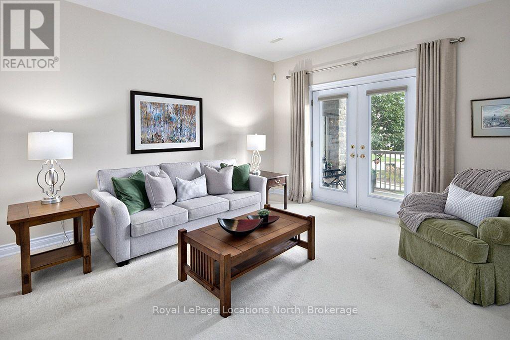 Living Room With Outdoor Access - 102 - 25 Beaver Street S, Blue Mountains, ON