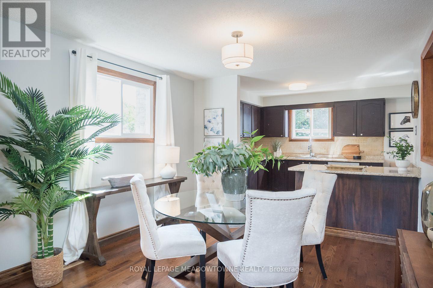 Dining area with natural light - 584 Hayward Crescent, Milton, ON