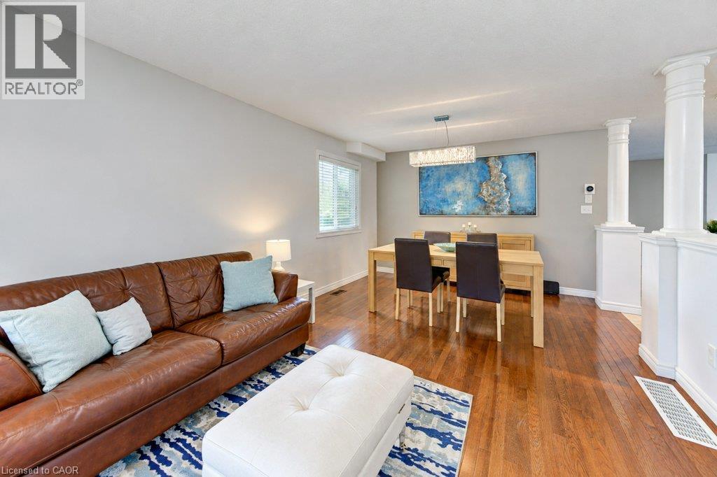 Hardwood-finish flooring, recessed lighting, and decorative half-wall columns - 88 Decaro Crescent, Cambridge, ON