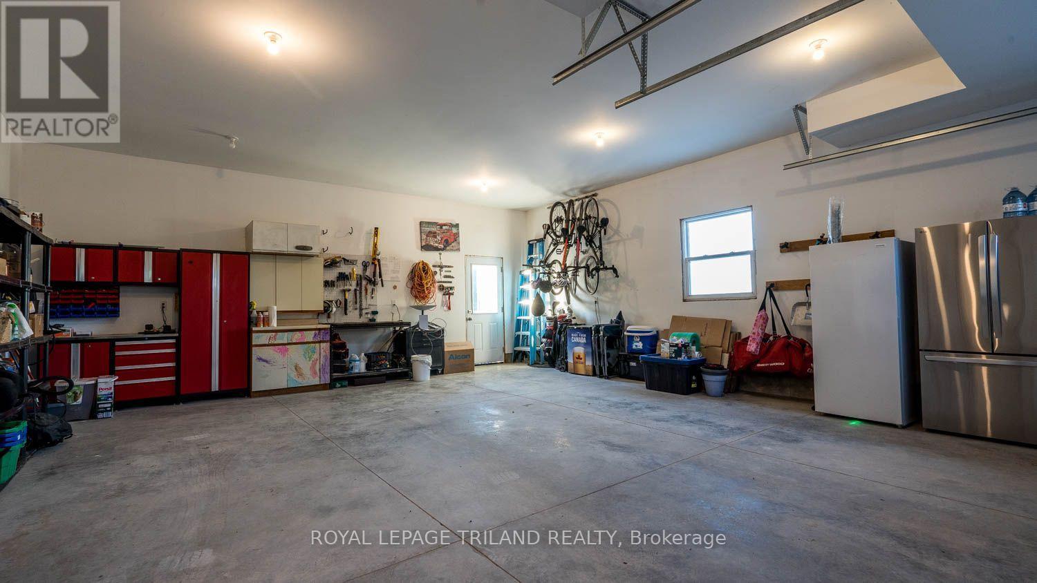 Oversized attached 2 car garage with in-floor heat - 11688 Charlton Drive, Middlesex Centre, ON