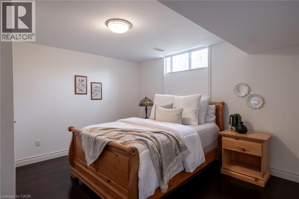 White painted walls with a flush-mount ceiling light - 1505 Milburough Line, Carlisle, ON