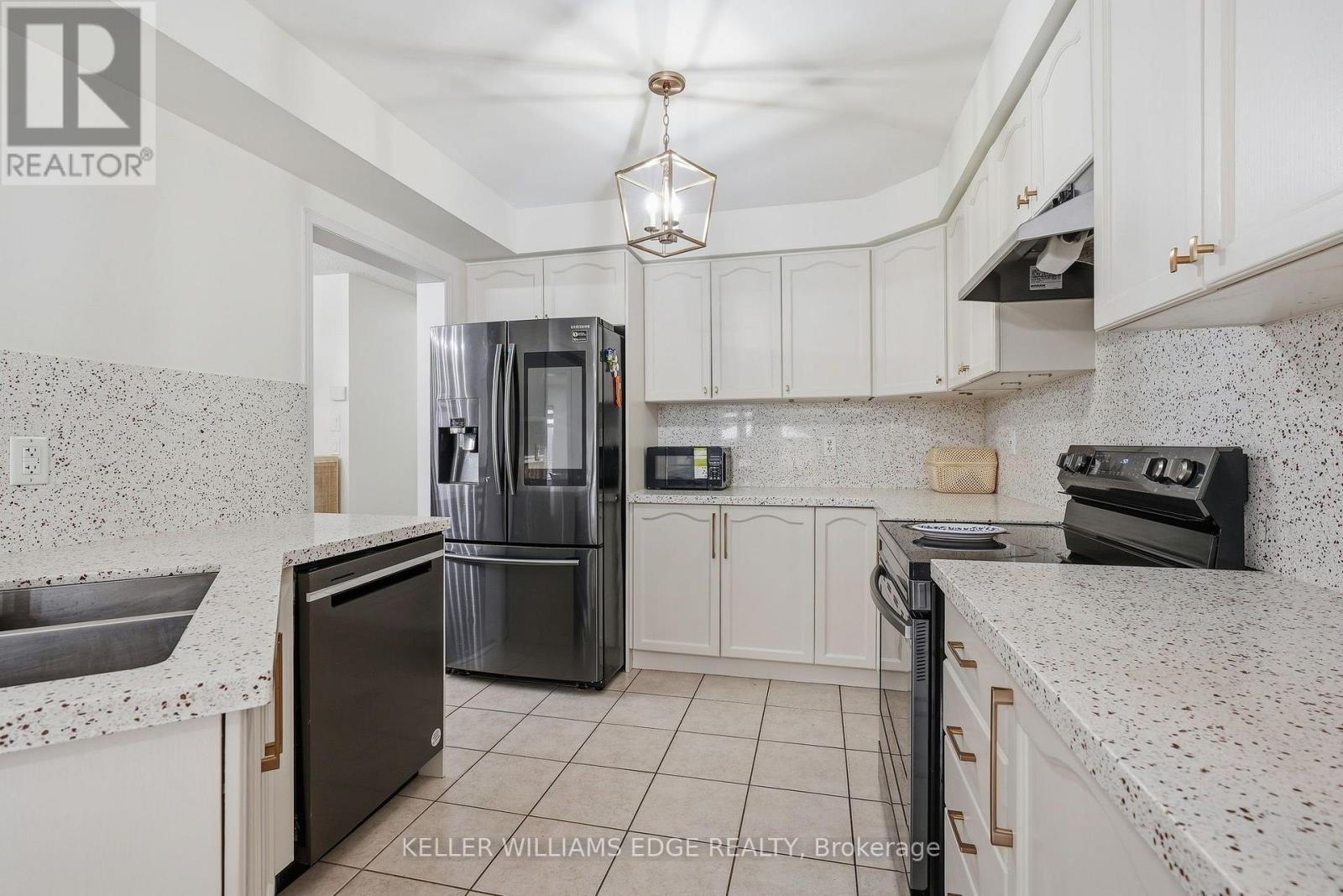 Kitchen w/ Stainless Steel Appliances - 4828 Verdi Street, Burlington, ON