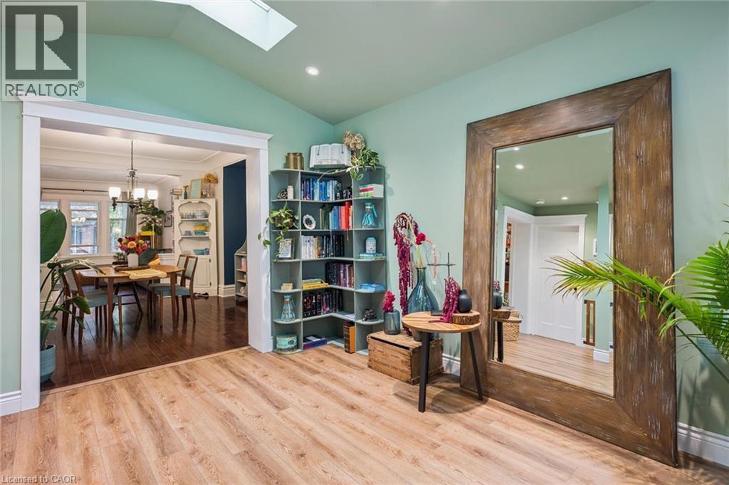 Bright, open living space featuring abundant natural light from skylight - 58 Balmoral Avenue N, Hamilton, ON