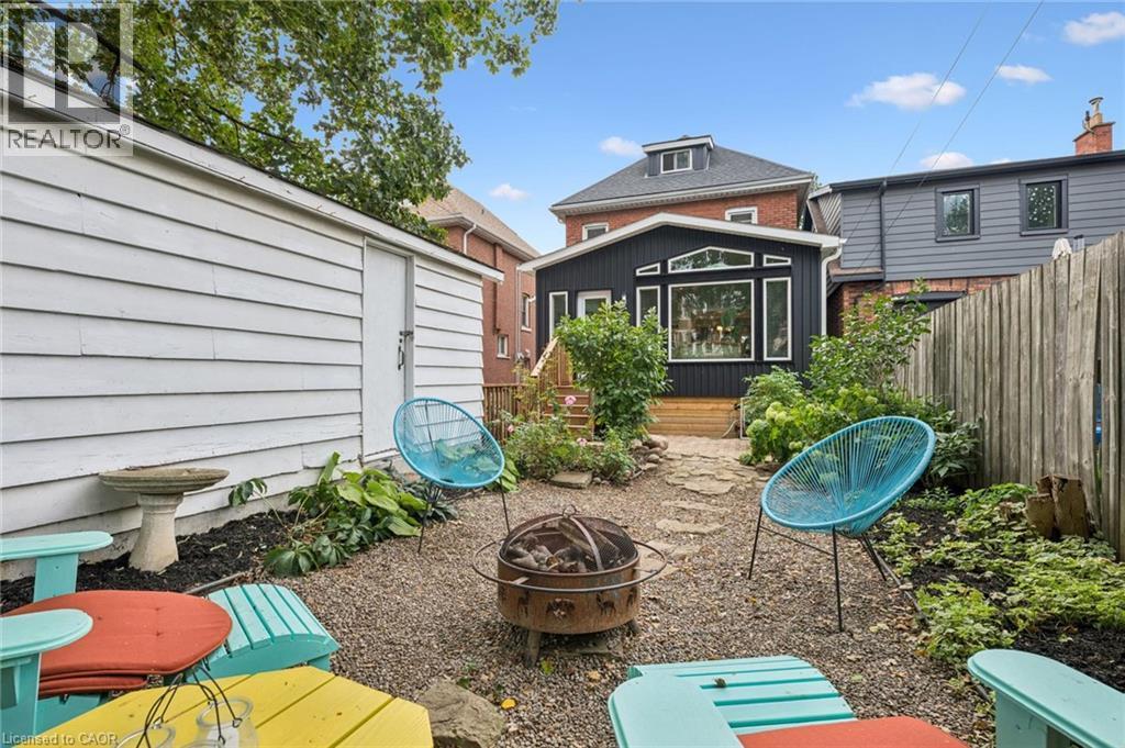 Pea gravel patio, detached garage - 58 Balmoral Avenue N, Hamilton, ON