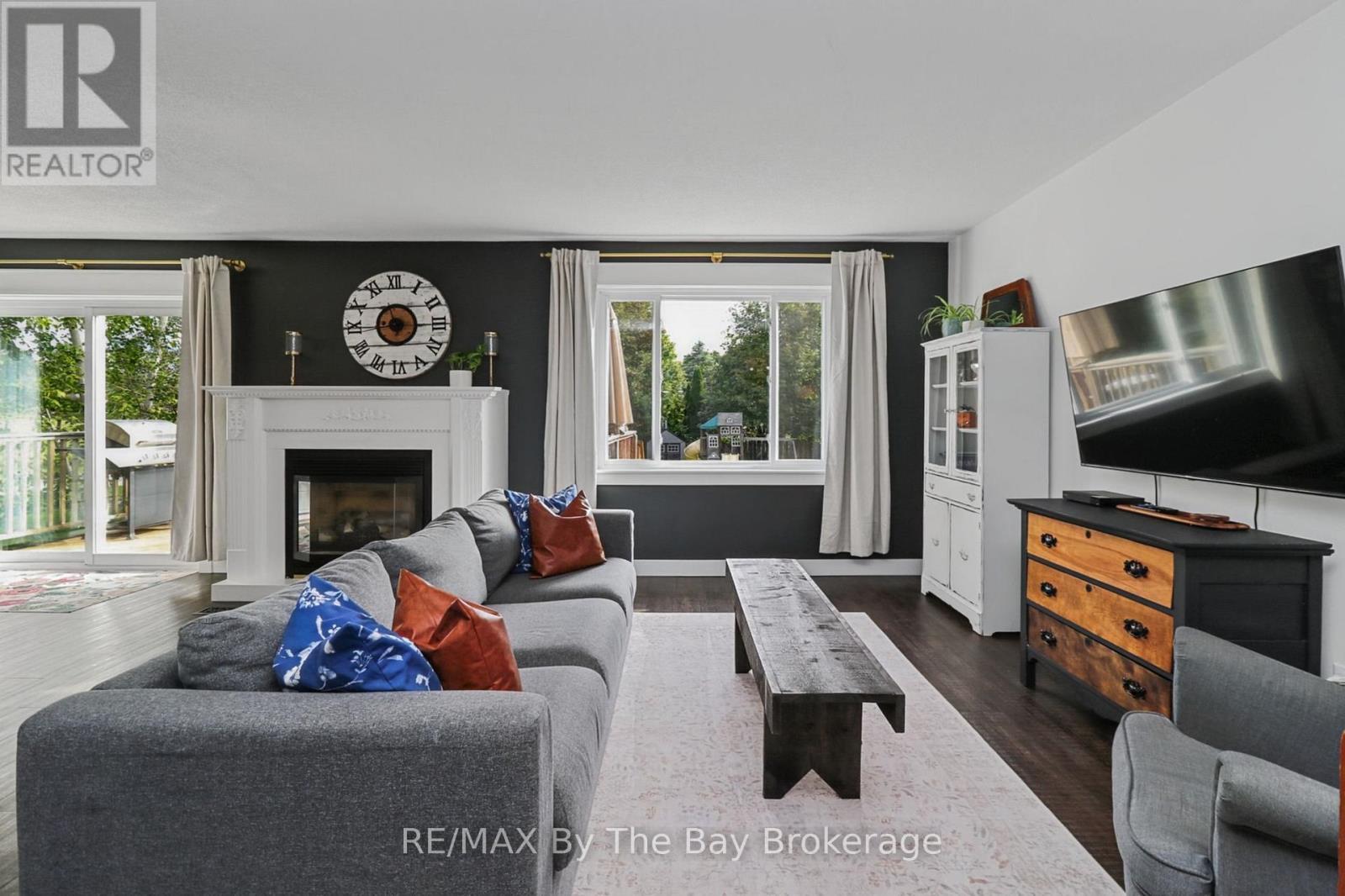 Living Area with Gas Fireplace - 2 Red Oak Drive, Wasaga Beach, ON
