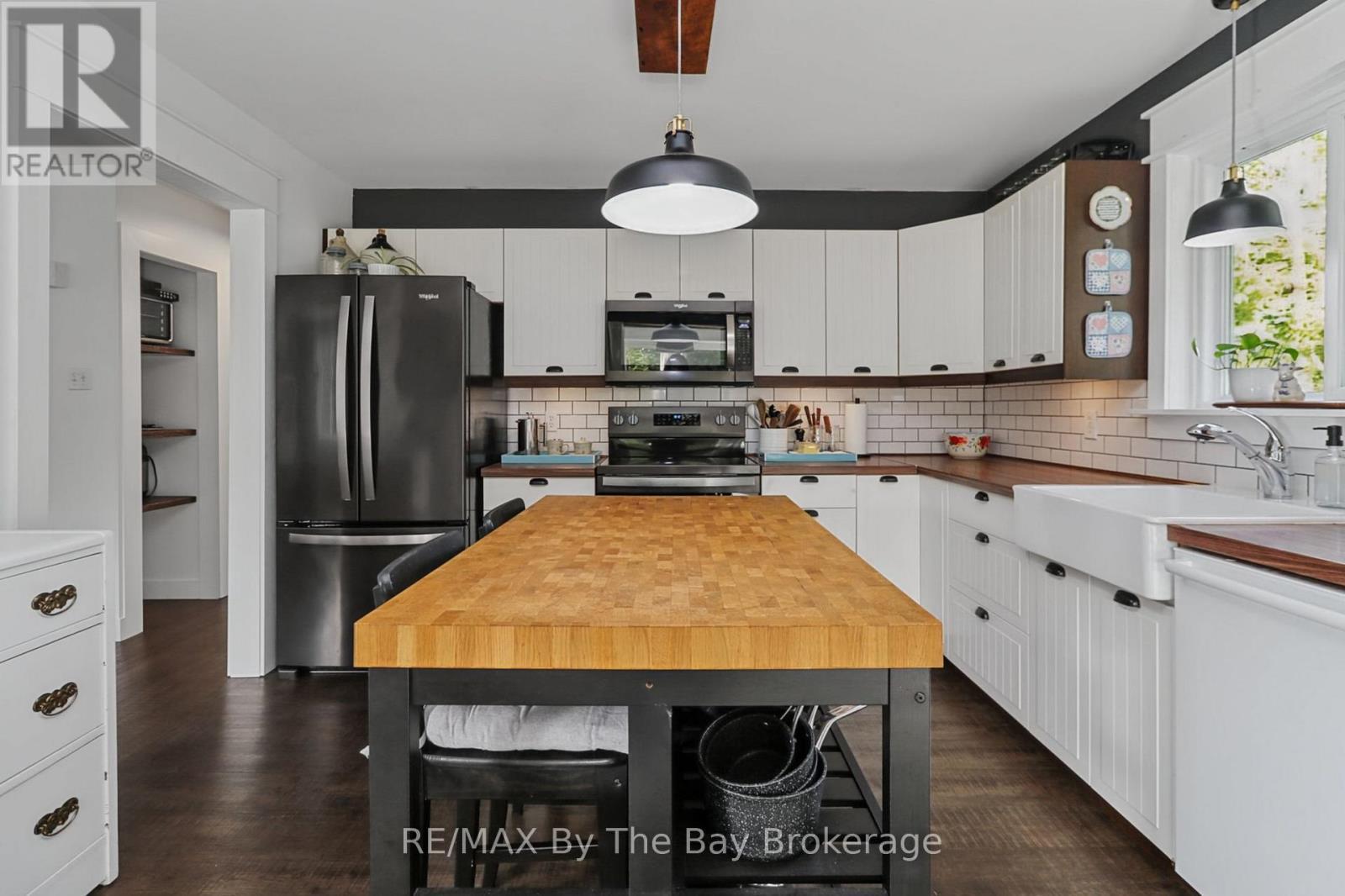 Kitchen Area with Black Stainless Appliances - 2 Red Oak Drive, Wasaga Beach, ON