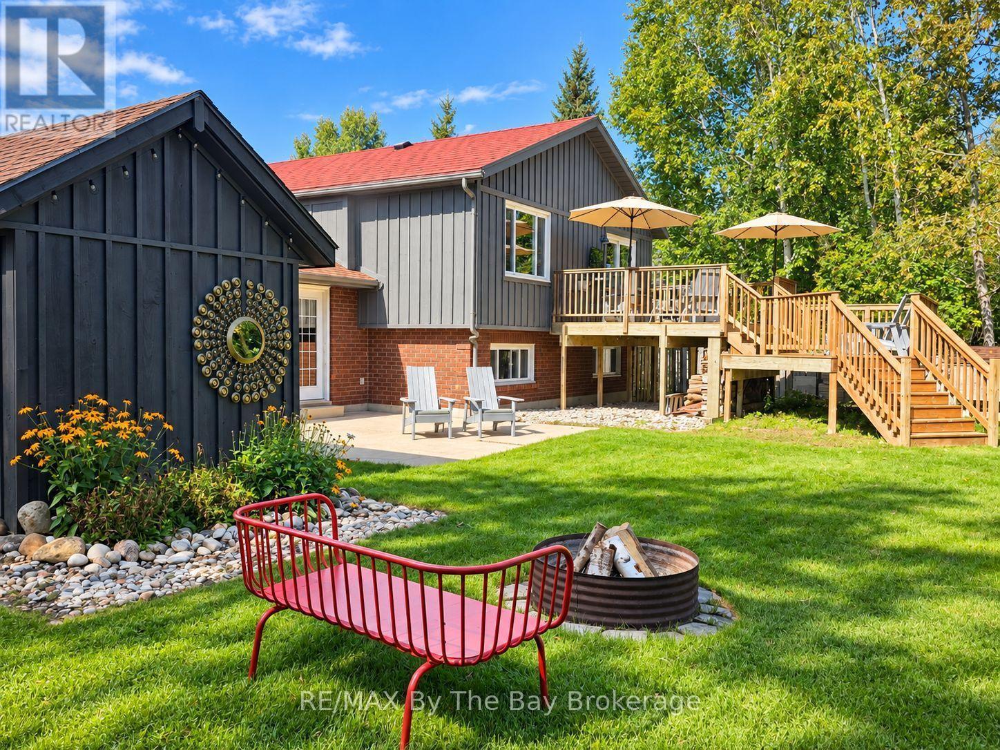 Landscaped Backyard with 2 Sheds - 2 Red Oak Drive, Wasaga Beach, ON