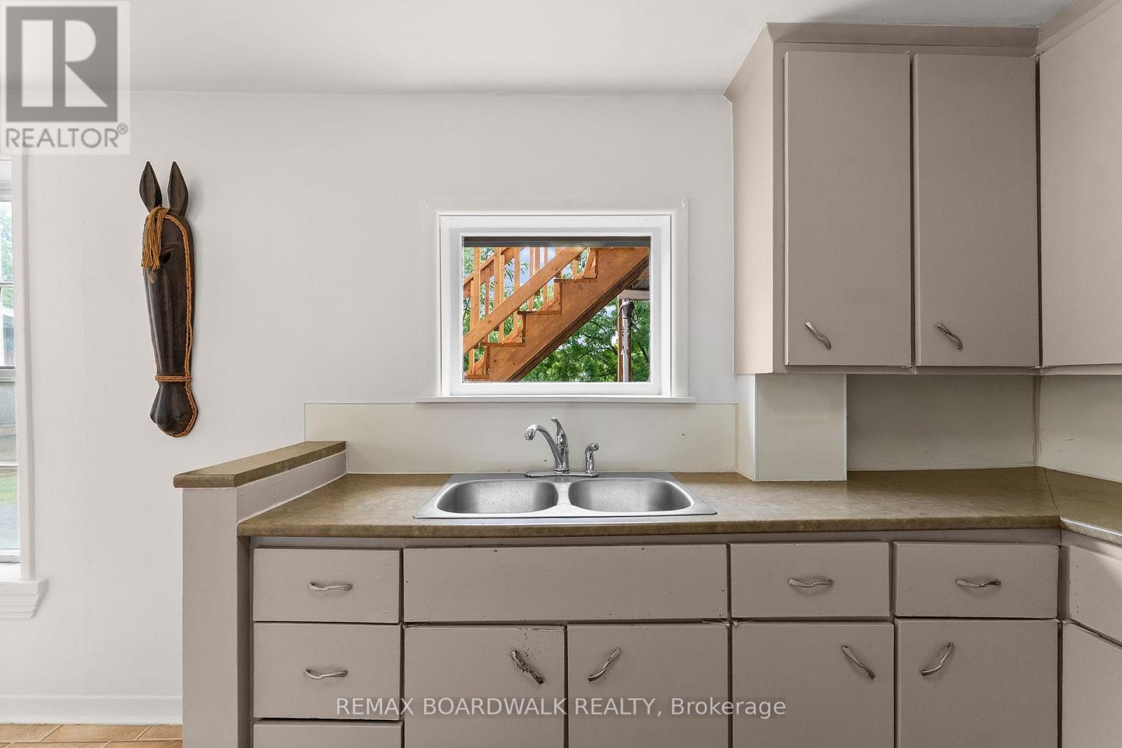Window overlooking backyard & water. - 110-112-114 Clothier Street E, North Grenville, ON